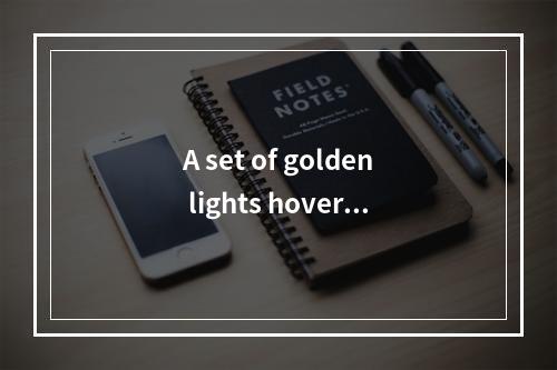 A set of golden lights hoverin